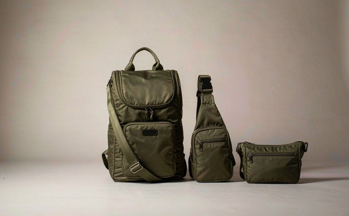 Custom bag bundle for a crowdfunding reward tier showing hero backpack, matching pouch and shared trims in one master carton